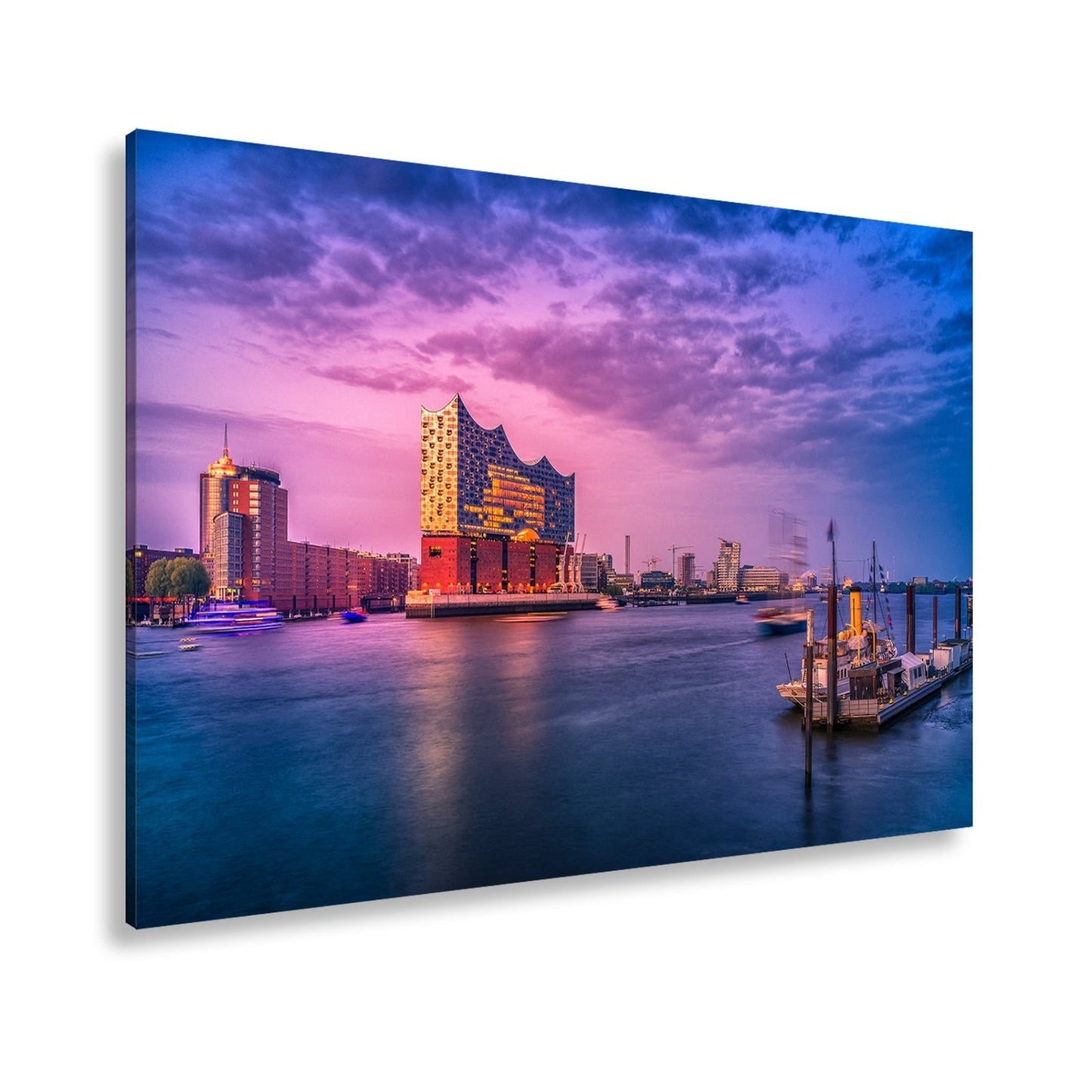 Leinwandbild Abendlicht küsst Hamburgs Hafen mit goldener Eleganz. - deyoli