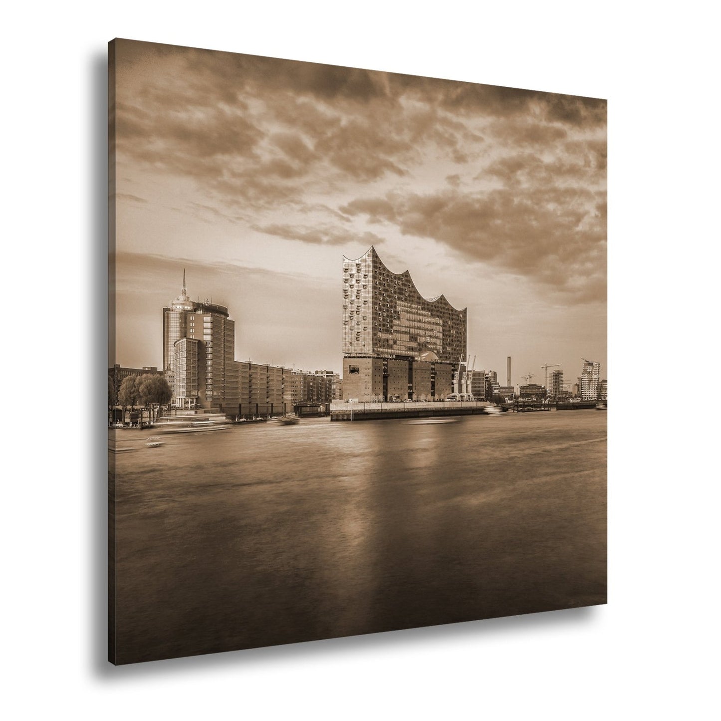 Leinwandbild Abendlicht küsst Hamburgs Hafen mit goldener Eleganz. - deyoli