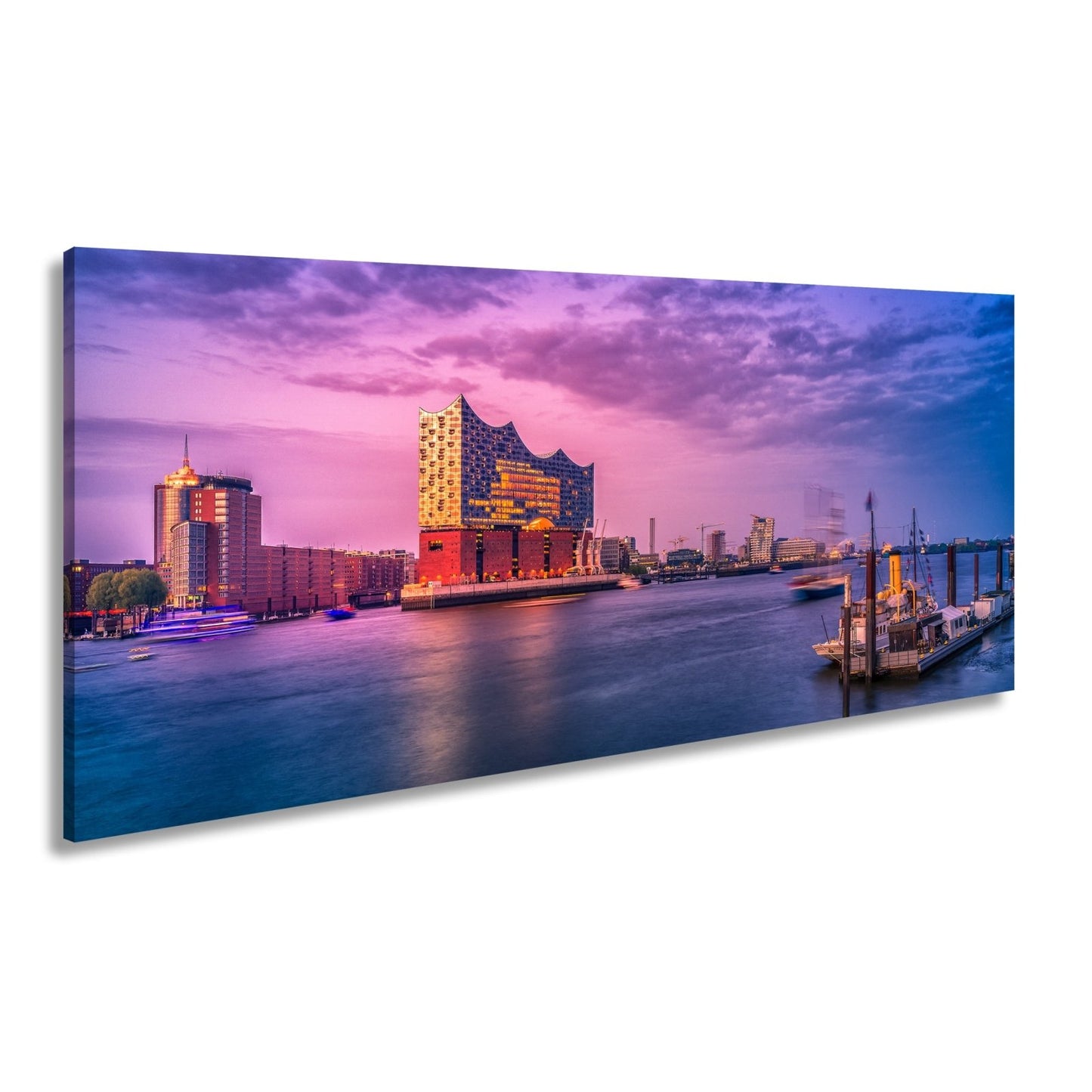 Leinwandbild Abendlicht küsst Hamburgs Hafen mit goldener Eleganz. - deyoli