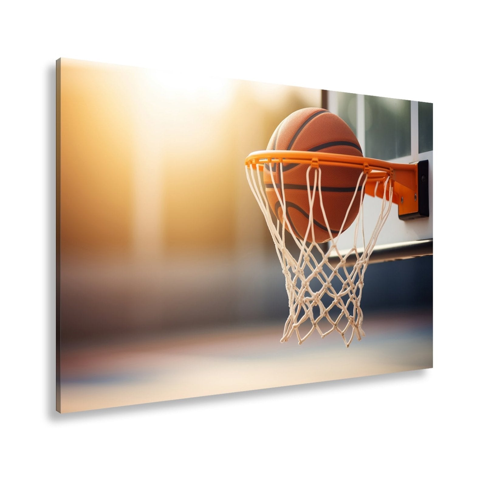 Leinwandbild Basketball versinkt elegant im Korb im sanften Licht. - deyoli