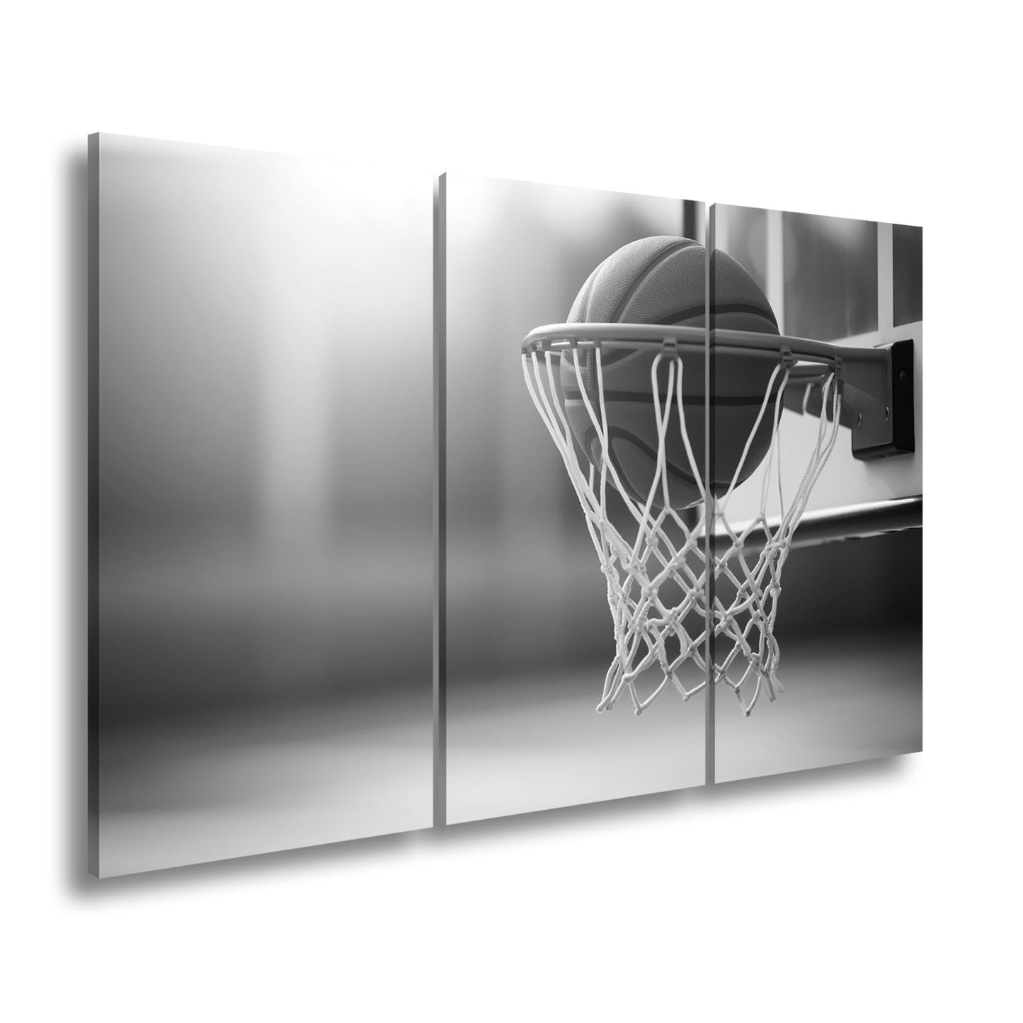 Leinwandbild Basketball versinkt elegant im Korb im sanften Licht. - deyoli