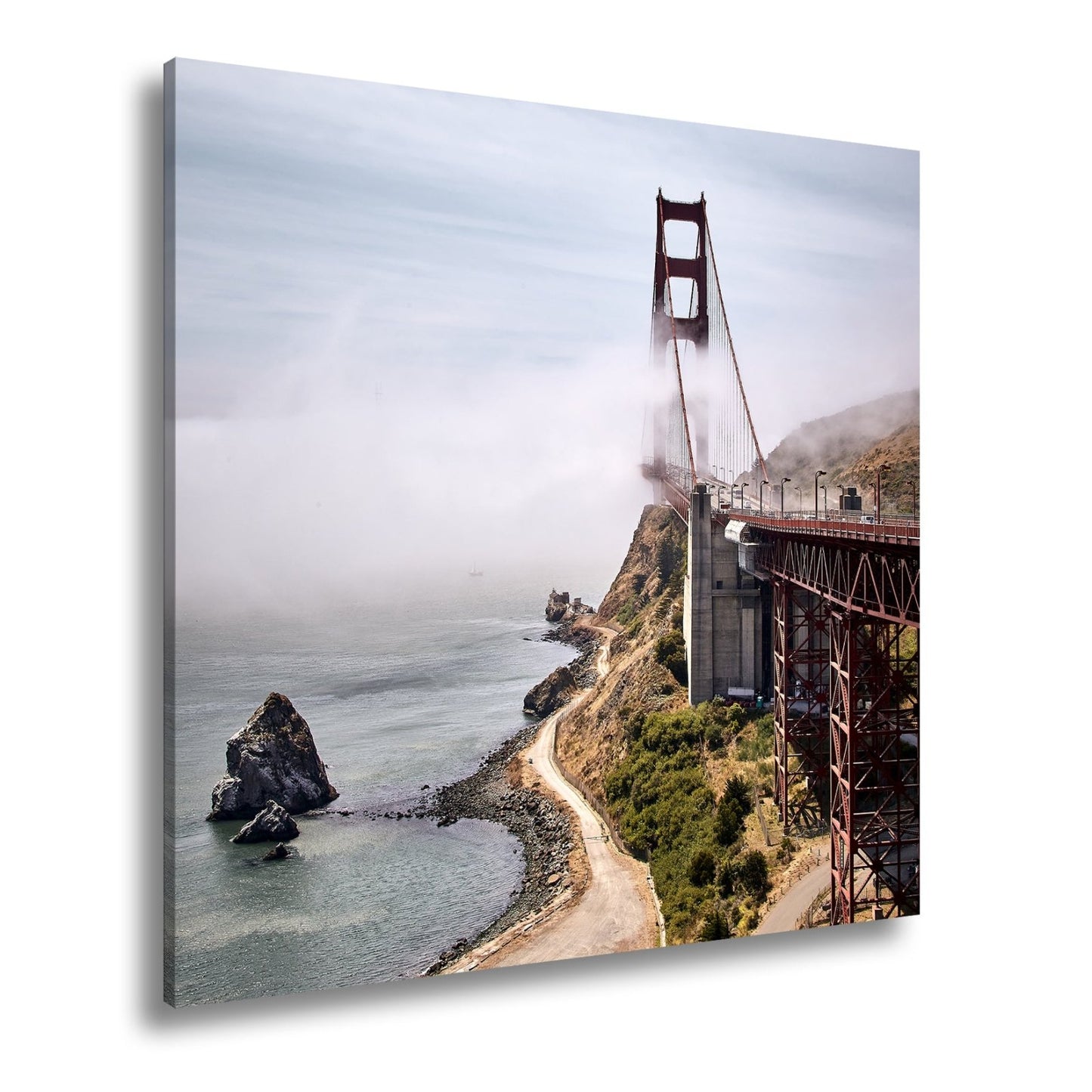 Leinwandbild Brücke im Nebel dramatische Küstenkulisse XXL – Landschaft Wandbild - deyoli