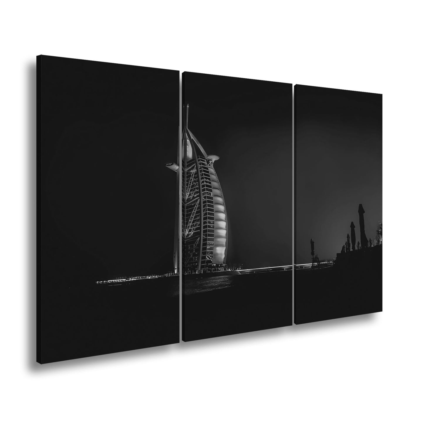Leinwandbild Burj Al Arab XXL – Leuchtet kraftvoll in der Nacht - deyoli