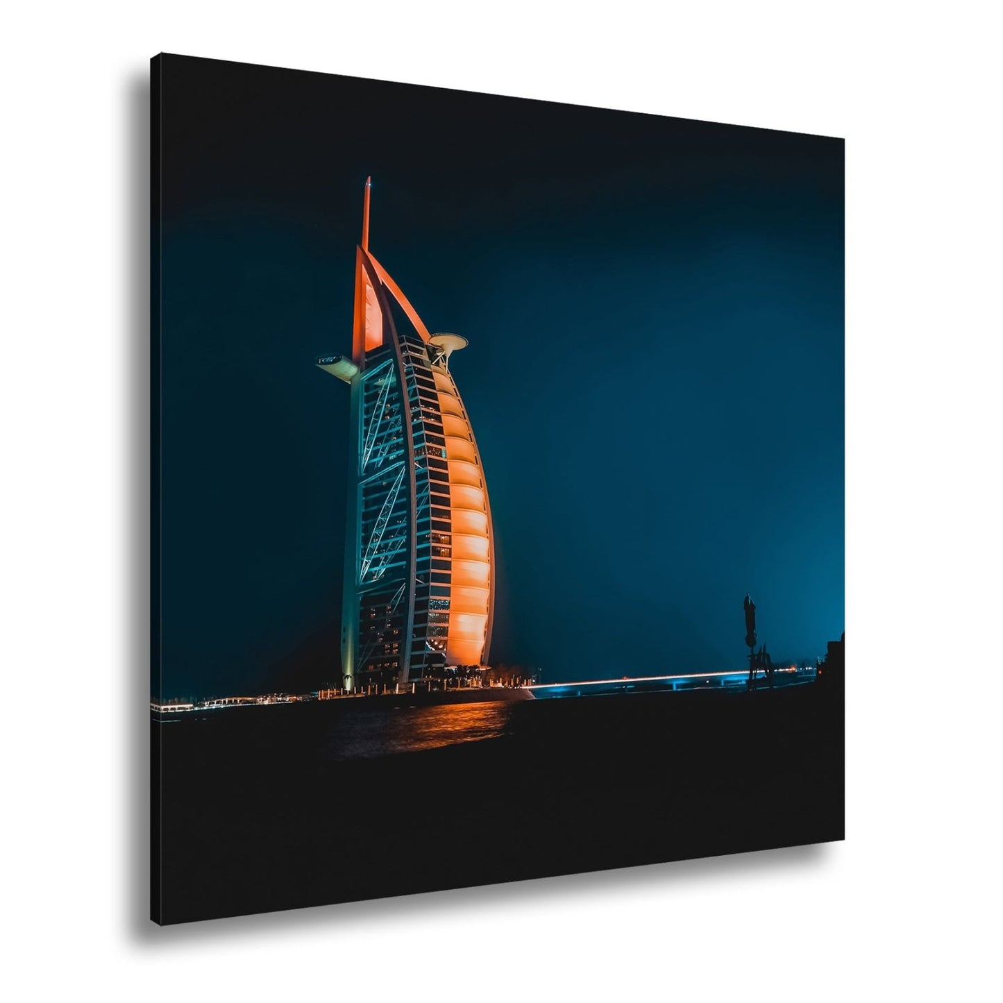 Leinwandbild Burj Al Arab XXL – Leuchtet kraftvoll in der Nacht - deyoli