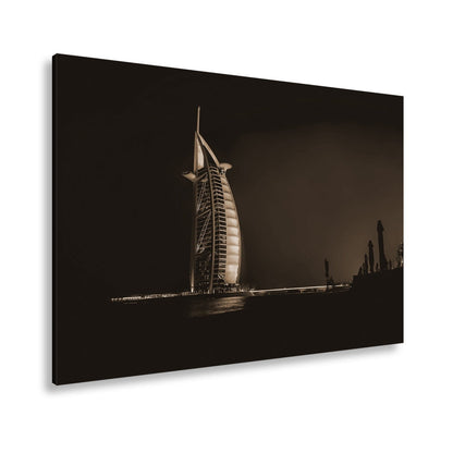 Leinwandbild Burj Al Arab XXL – Leuchtet kraftvoll in der Nacht - deyoli