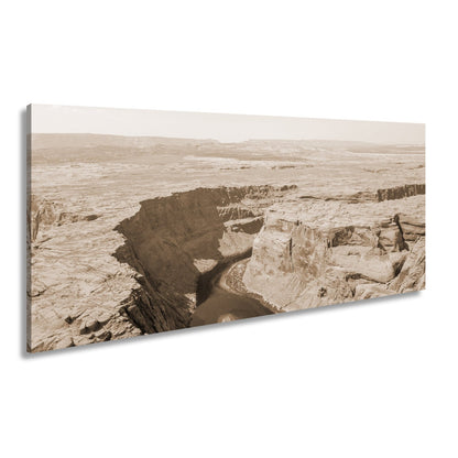 Leinwandbild Canyon XXL – Tiefe Schlucht mit grünem Fluss & Naturgewalt - deyoli