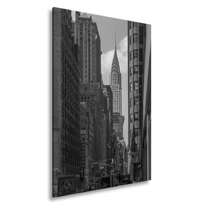 Leinwandbild Chrysler Building glänzt art - déco - elegant zwischen warmen Fassaden - deyoli