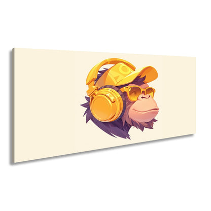 Leinwandbild Cooler Monkey mit Cap und Kopfhörern im sonnigen Streetstyle - deyoli