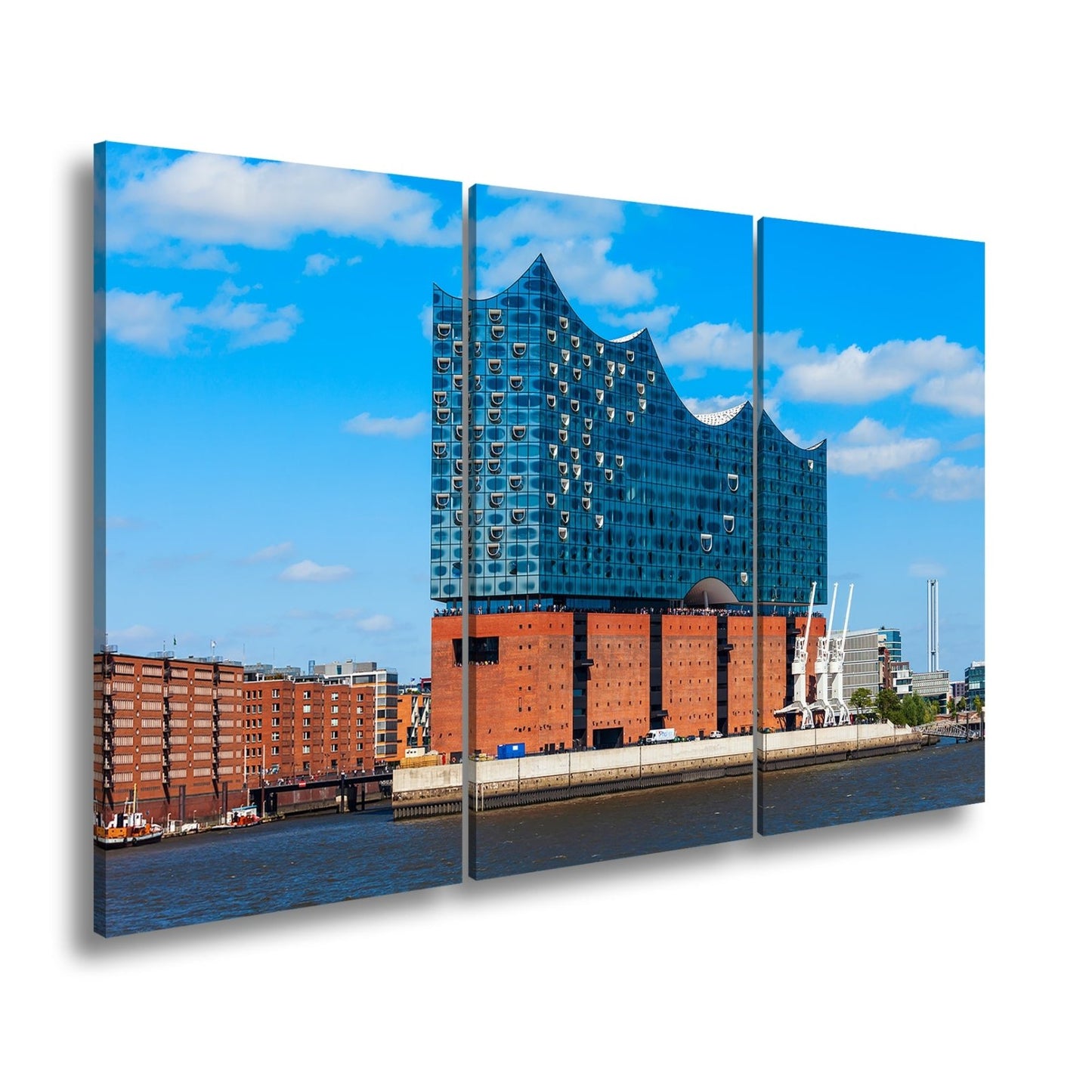Leinwandbild Die Elbphilharmonie glänzt unter klarem Himmel am Strom. - deyoli
