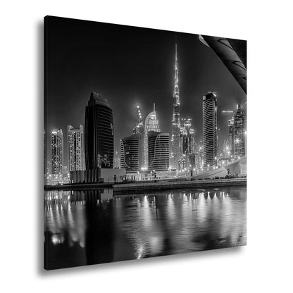 Leinwandbild Dubai XXL – Skyline bei Nacht mit funkelndem Lichterglanz - deyoli