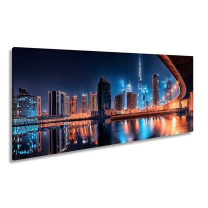 Leinwandbild Dubai XXL – Skyline bei Nacht mit funkelndem Lichterglanz - deyoli