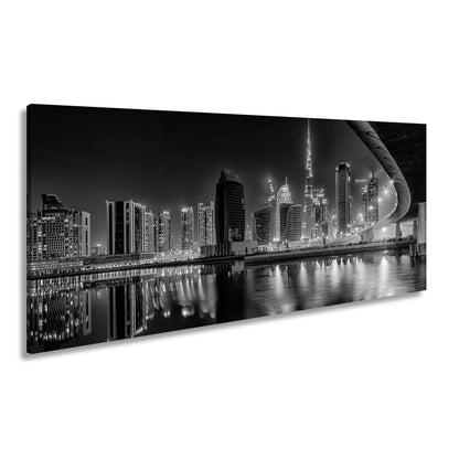 Leinwandbild Dubai XXL – Skyline bei Nacht mit funkelndem Lichterglanz - deyoli