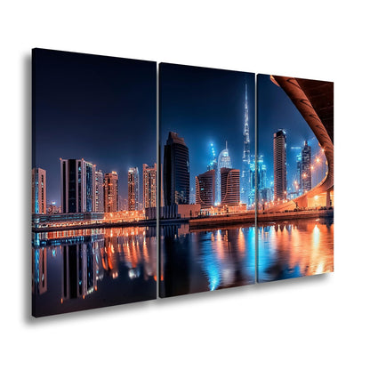 Leinwandbild Dubai XXL – Skyline bei Nacht mit funkelndem Lichterglanz - deyoli