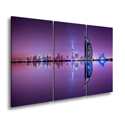 Leinwandbild Dubai XXL – Skyline in lila - glänzender Nacht - deyoli