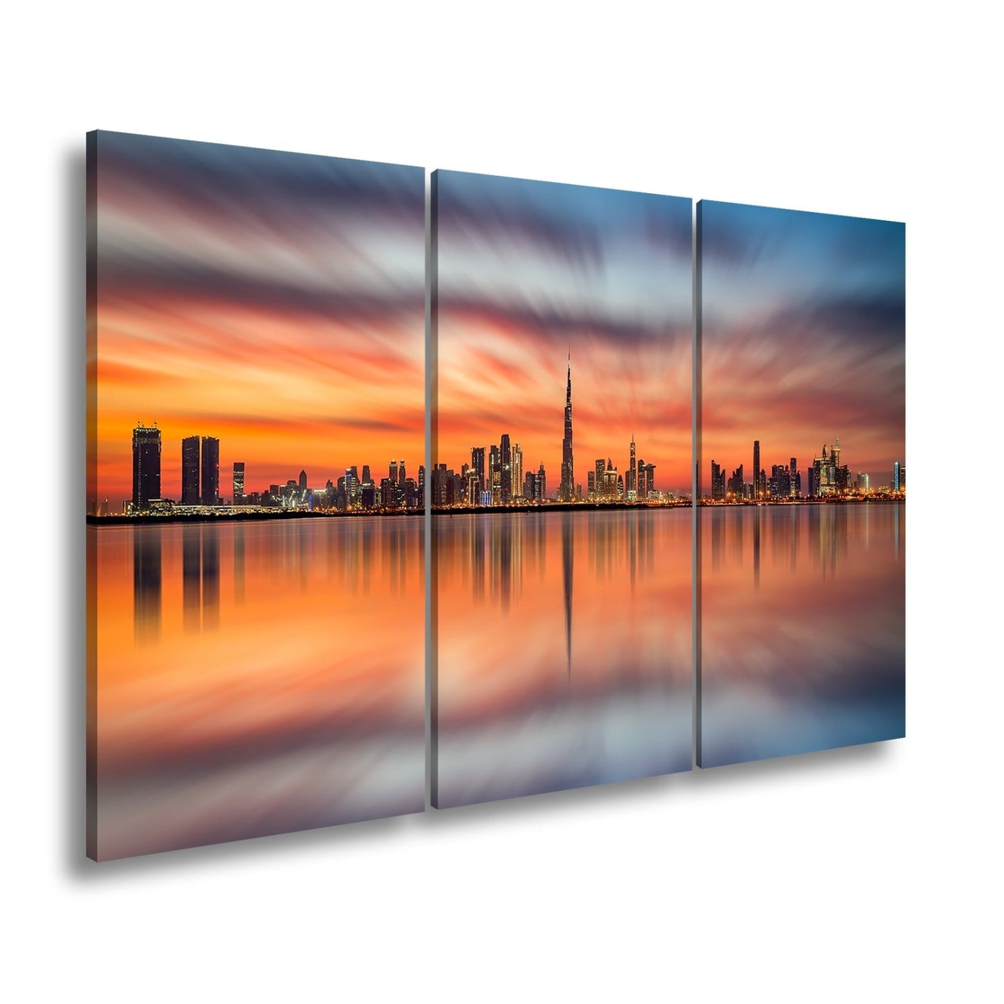 Leinwandbild Dubai XXL – Skyline spiegelt im glühenden Abendhimmel - deyoli