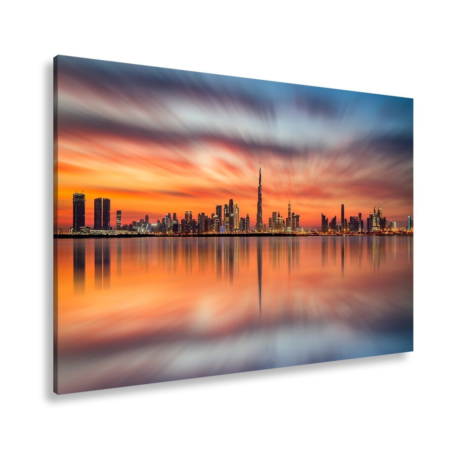 Leinwandbild Dubai XXL – Skyline spiegelt im glühenden Abendhimmel - deyoli