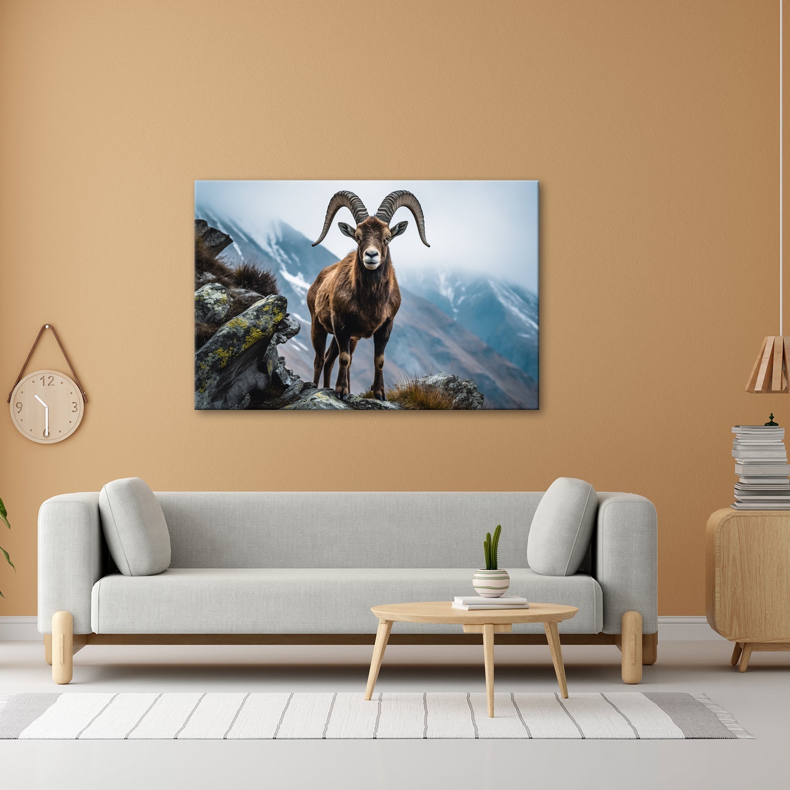 Leinwandbild Ein stolzer Steinbock vor majestätischer Bergkulisse. - deyoli