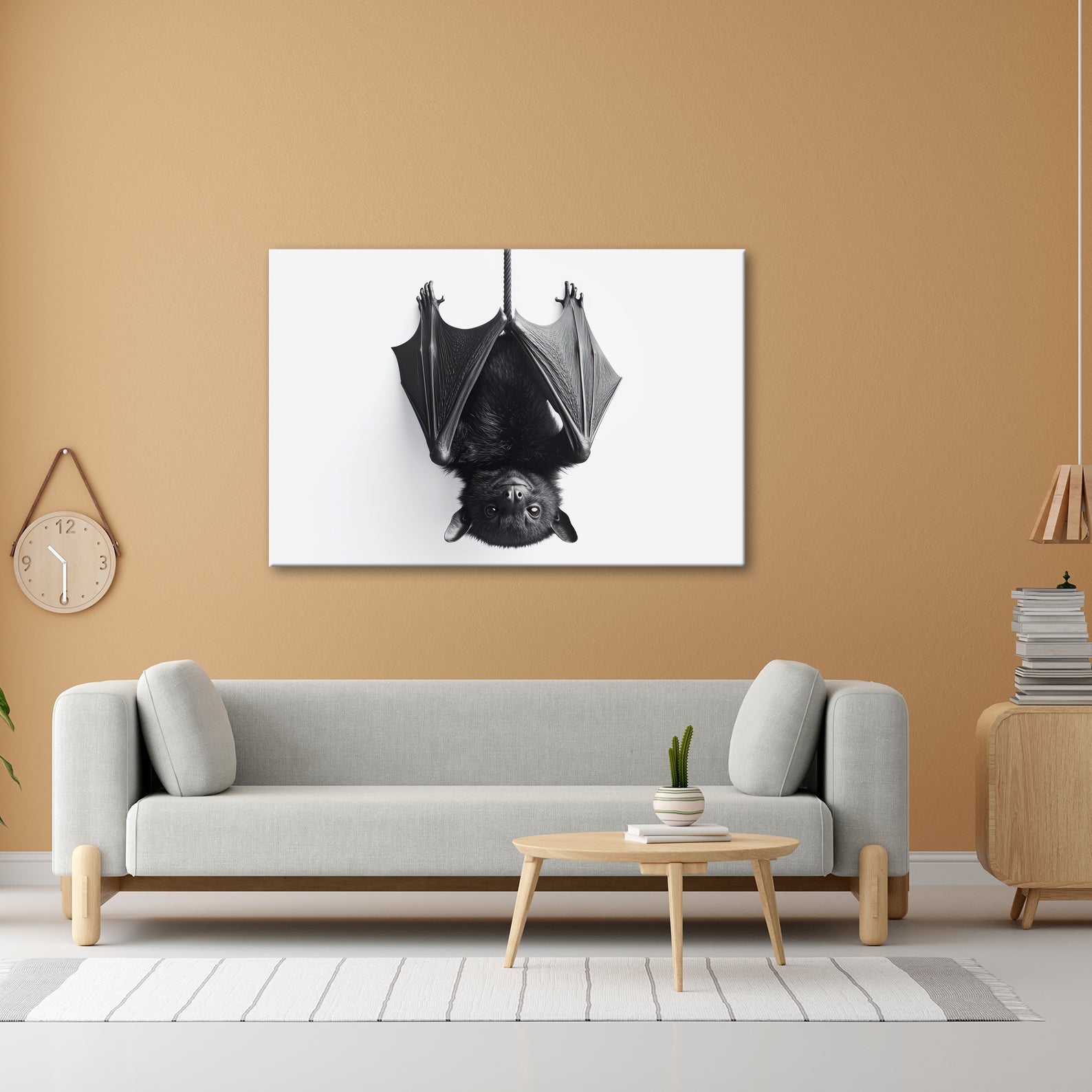 Leinwandbild Elegante Fledermaus hängt still im weißen Raum - deyoli