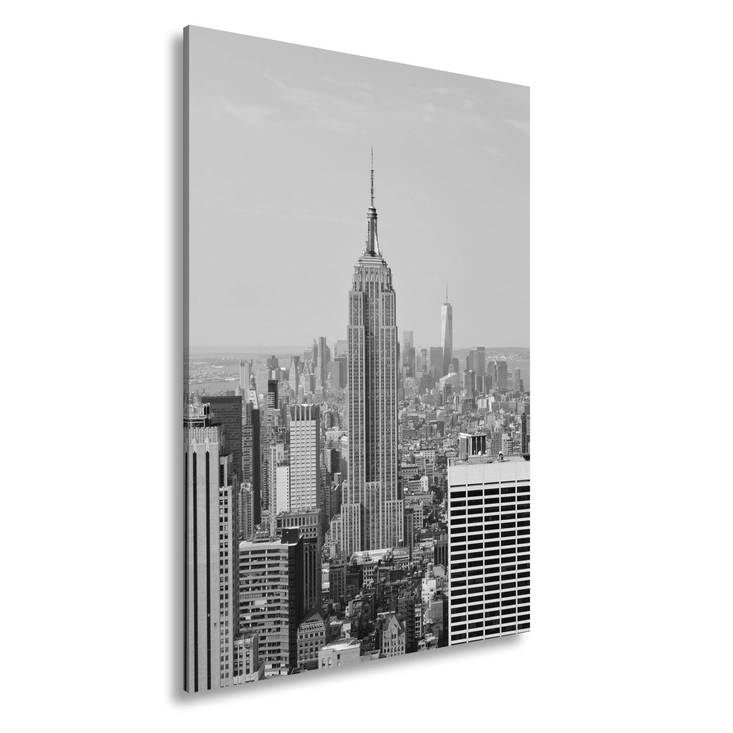 Leinwandbild Empire State erhebt sich majestätisch über Manhattans Meer aus Türmen - deyoli