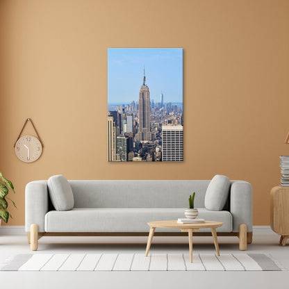 Leinwandbild Empire State erhebt sich majestätisch über Manhattans Meer aus Türmen - deyoli