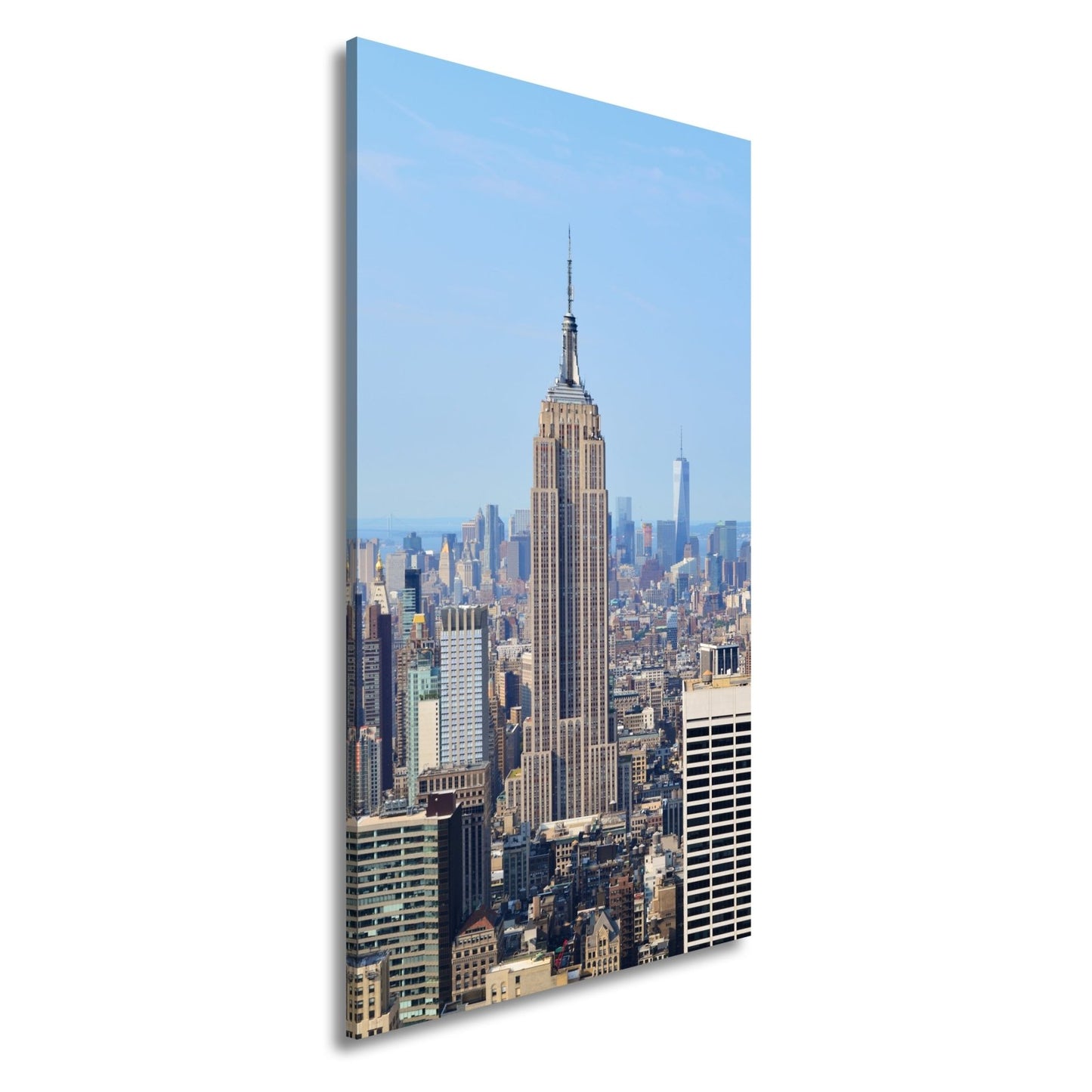 Leinwandbild Empire State erhebt sich majestätisch über Manhattans Meer aus Türmen - deyoli