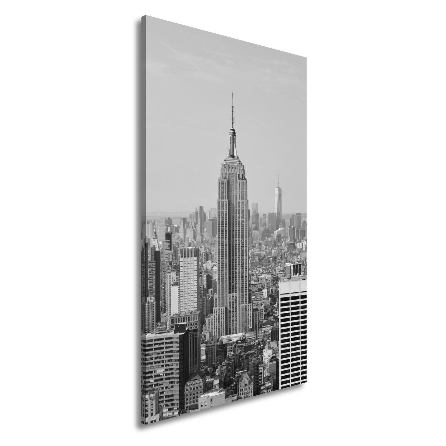 Leinwandbild Empire State erhebt sich majestätisch über Manhattans Meer aus Türmen - deyoli