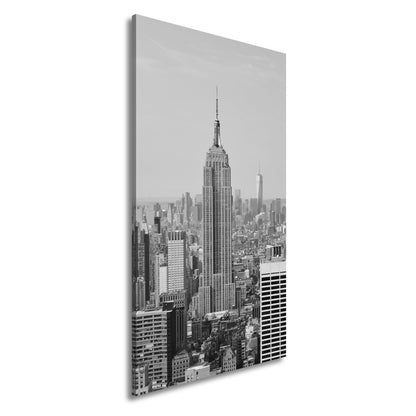Leinwandbild Empire State erhebt sich majestätisch über Manhattans Meer aus Türmen - deyoli