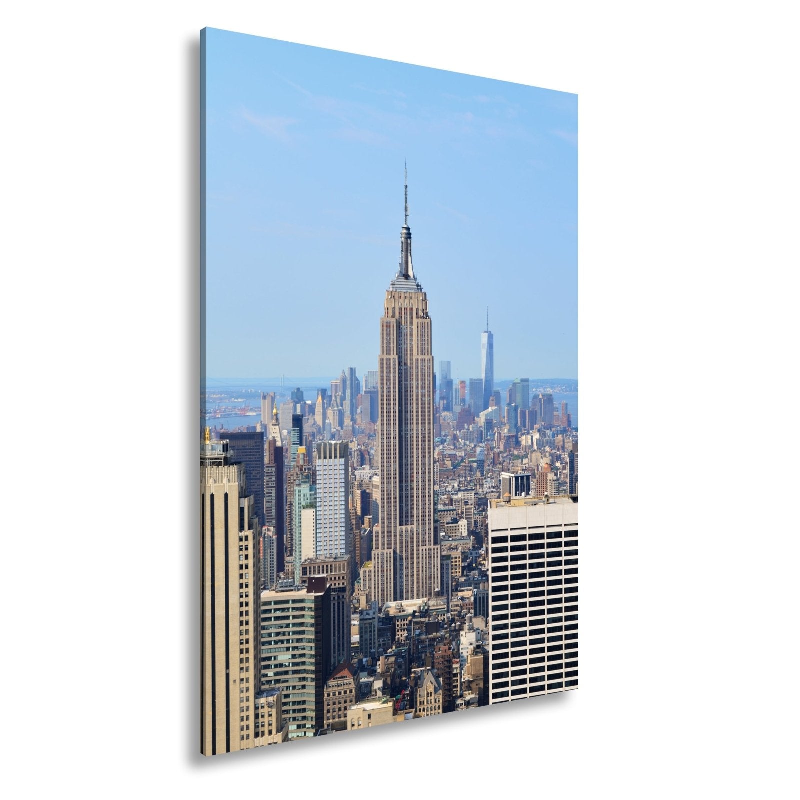 Leinwandbild Empire State erhebt sich majestätisch über Manhattans Meer aus Türmen - deyoli