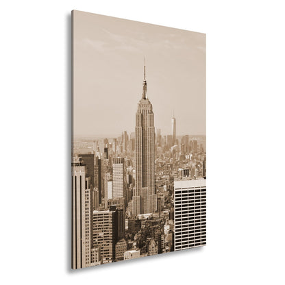 Leinwandbild Empire State erhebt sich majestätisch über Manhattans Meer aus Türmen - deyoli