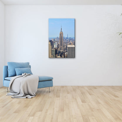 Leinwandbild Empire State erhebt sich majestätisch über Manhattans Meer aus Türmen - deyoli