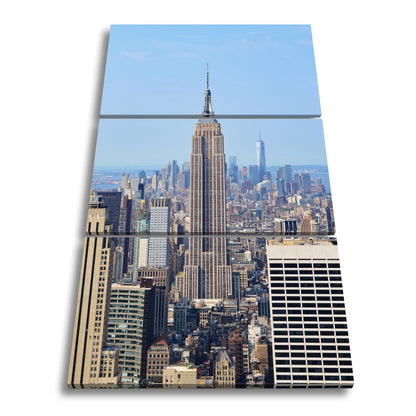 Leinwandbild Empire State erhebt sich majestätisch über Manhattans Meer aus Türmen - deyoli