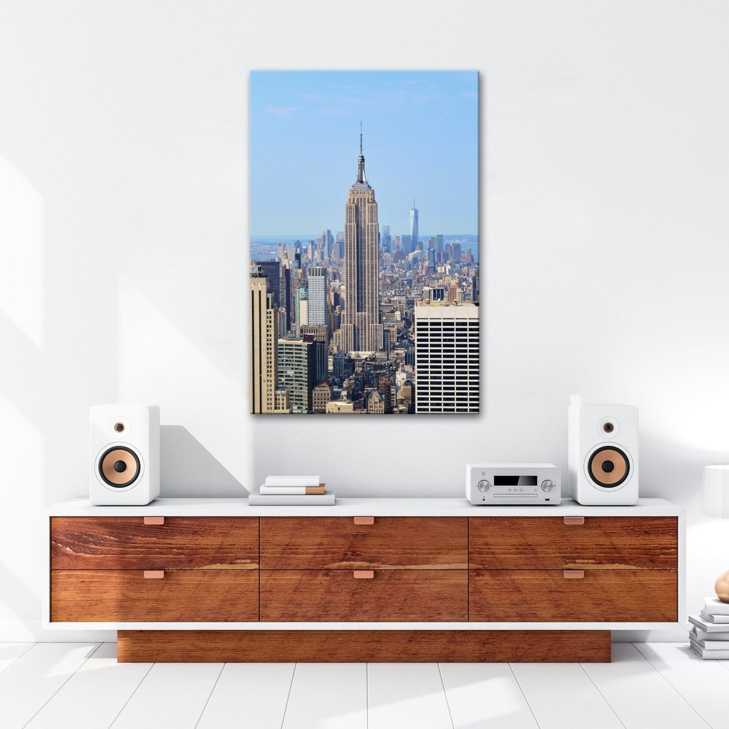 Leinwandbild Empire State erhebt sich majestätisch über Manhattans Meer aus Türmen - deyoli
