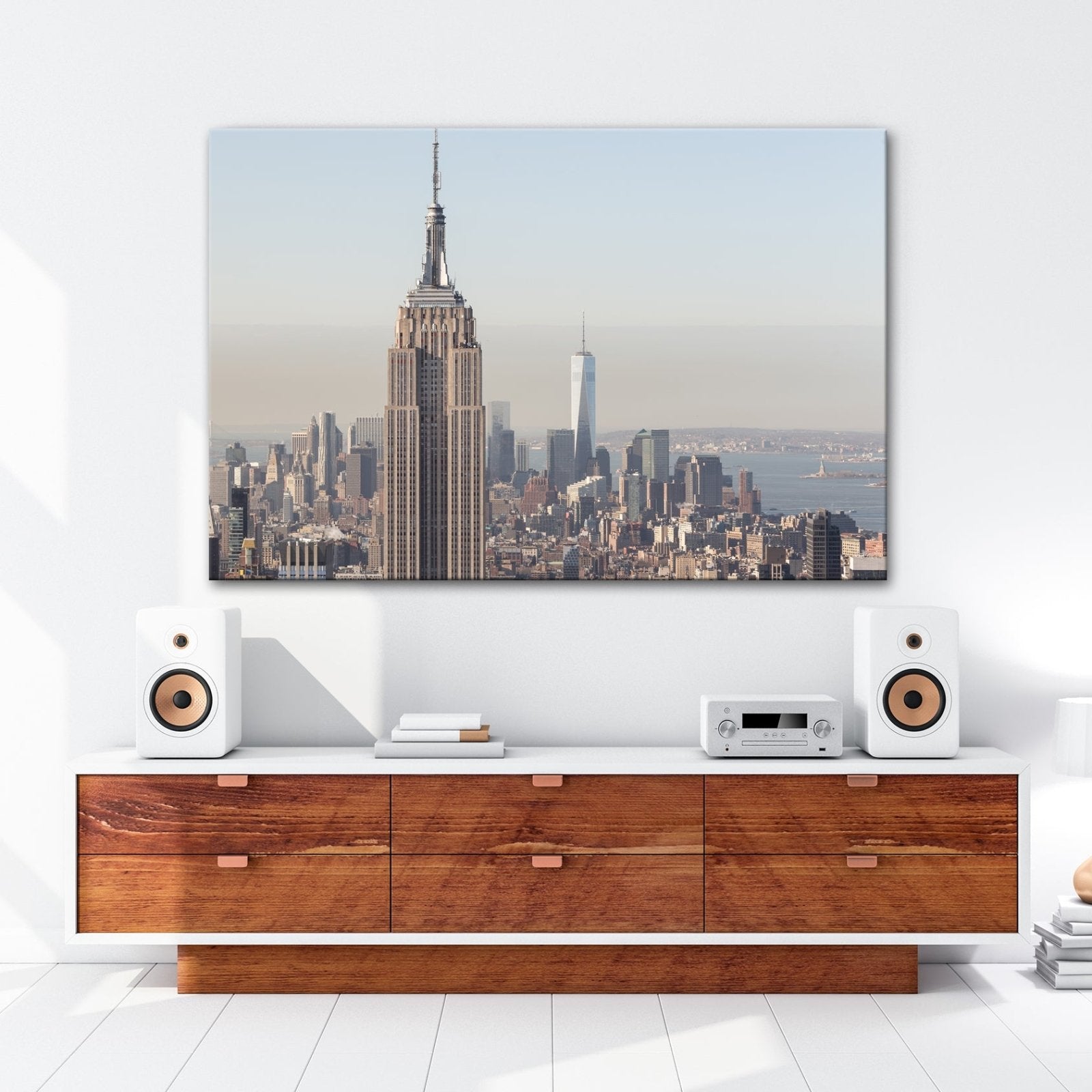 Leinwandbild Empire State thront klar über einer hellen skyline am ruhigen Morgen - deyoli