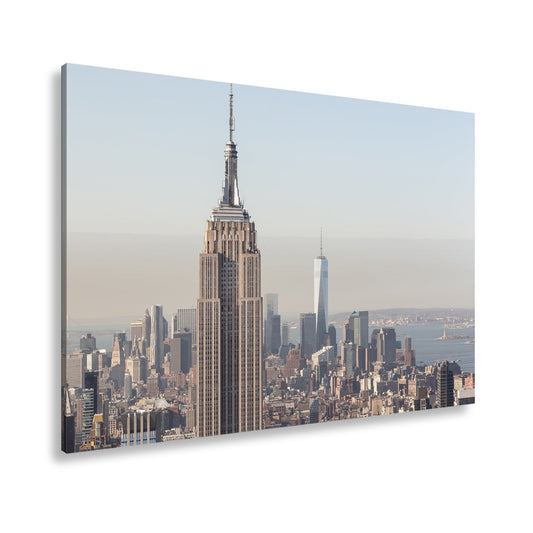 Leinwandbild Empire State thront klar über einer hellen skyline am ruhigen Morgen - deyoli