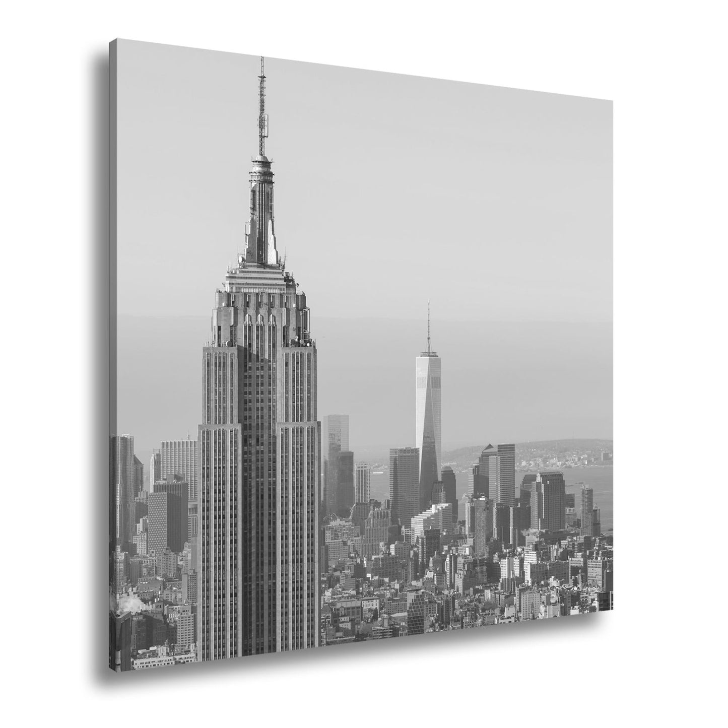 Leinwandbild Empire State thront klar über einer hellen skyline am ruhigen Morgen - deyoli