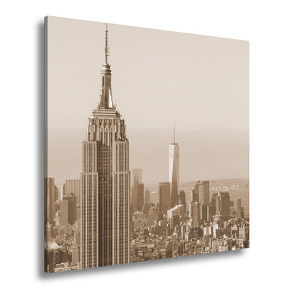 Leinwandbild Empire State thront klar über einer hellen skyline am ruhigen Morgen - deyoli