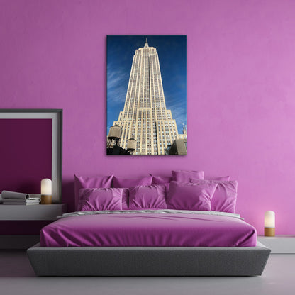 Leinwandbild Empire State XXL – Majestätisch ragt in den blauen Himmel - deyoli