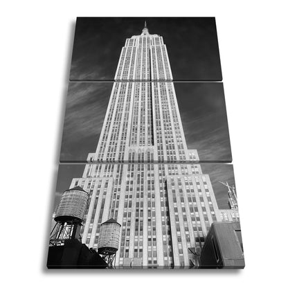 Leinwandbild Empire State XXL – Majestätisch ragt in den blauen Himmel - deyoli