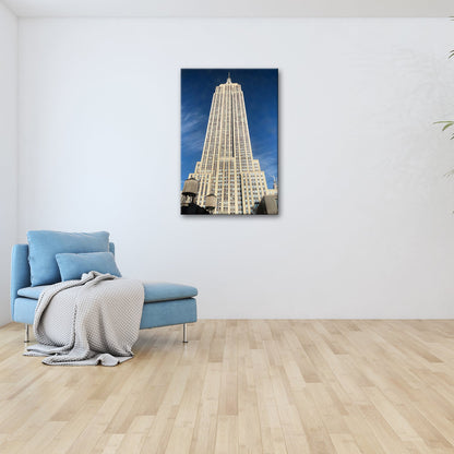 Leinwandbild Empire State XXL – Majestätisch ragt in den blauen Himmel - deyoli
