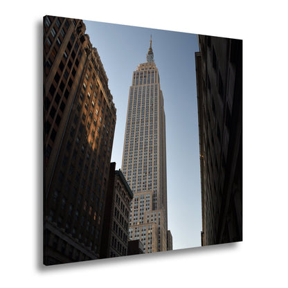 Leinwandbild Empire State XXL – Majestätisch zwischen dunklen Straßenschluchten - deyoli