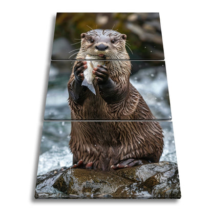 Leinwandbild Fang des Tages – Otterglück mit tropfender Beute. - deyoli