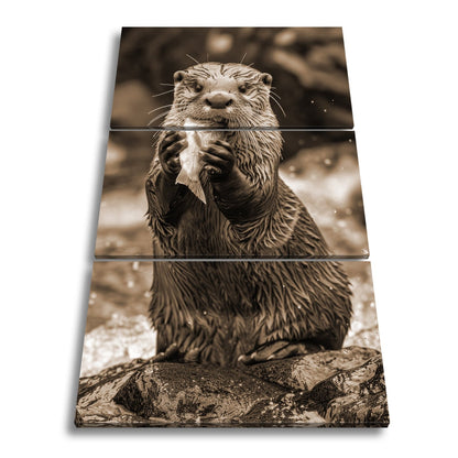Leinwandbild Fang des Tages – Otterglück mit tropfender Beute. - deyoli
