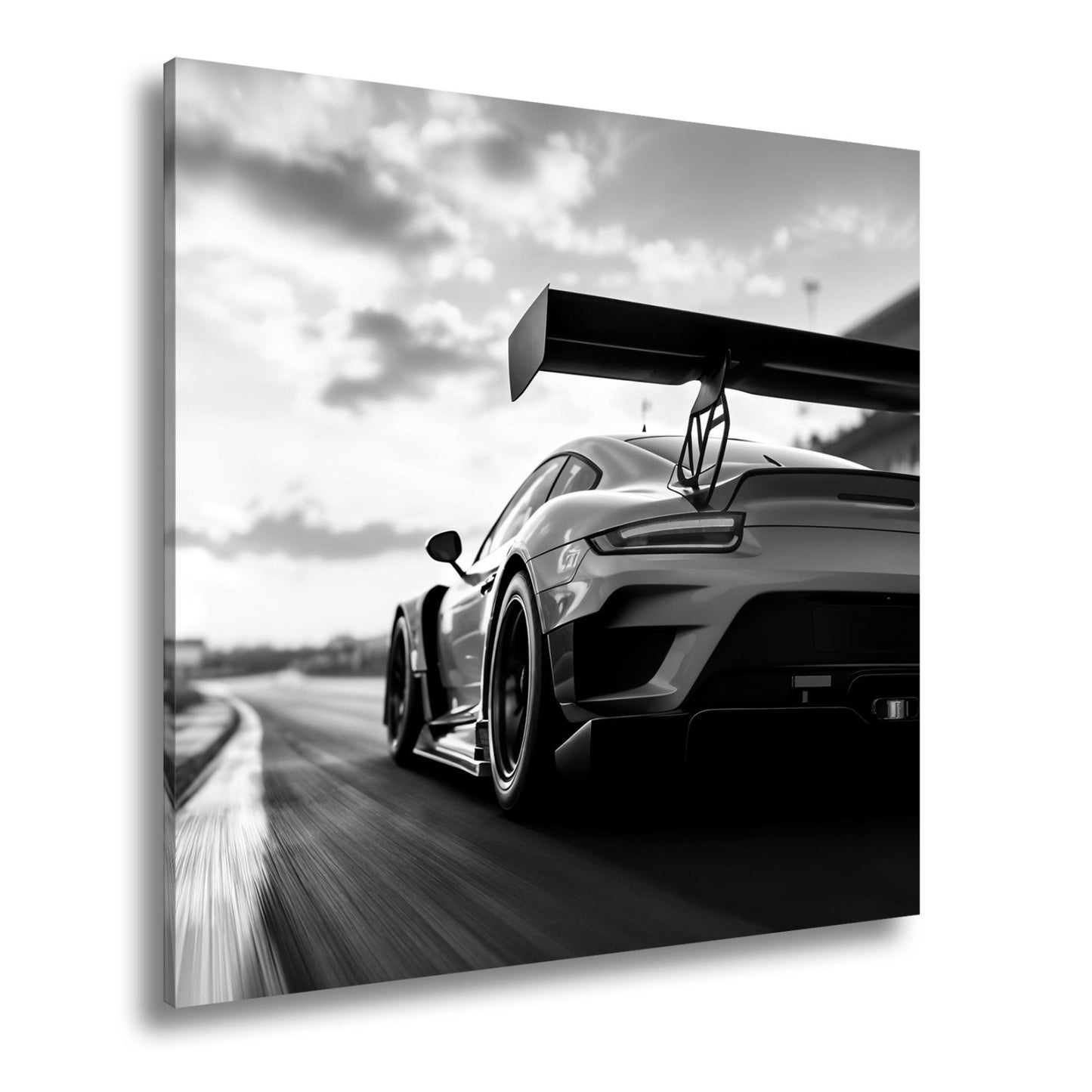 Leinwandbild Flügel aus Carbon rasen ins goldene Licht XXL – Auto Rennstrecke - deyoli