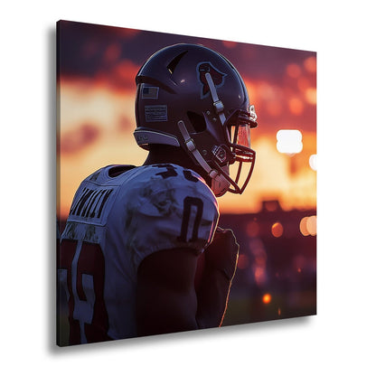 Leinwandbild Footballer im Sonnenuntergang – Fokus im letzten Licht. - deyoli