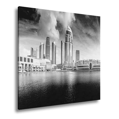 Leinwandbild Glitzernde Skyline spiegelt sich im türkisblauen Wasser Dubais - deyoli