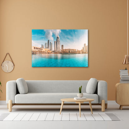 Leinwandbild Glitzernde Skyline spiegelt sich im türkisblauen Wasser Dubais - deyoli