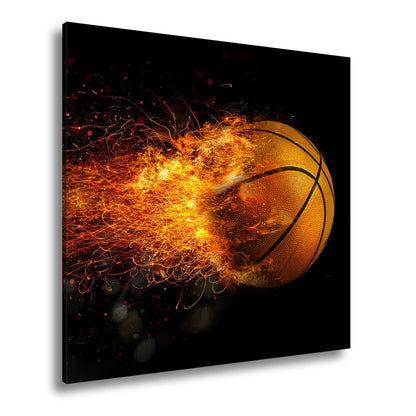 Leinwandbild Glühender Basketball entfacht feurige Energie in der Luft. - deyoli