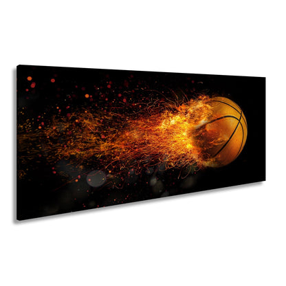 Leinwandbild Glühender Basketball entfacht feurige Energie in der Luft. - deyoli
