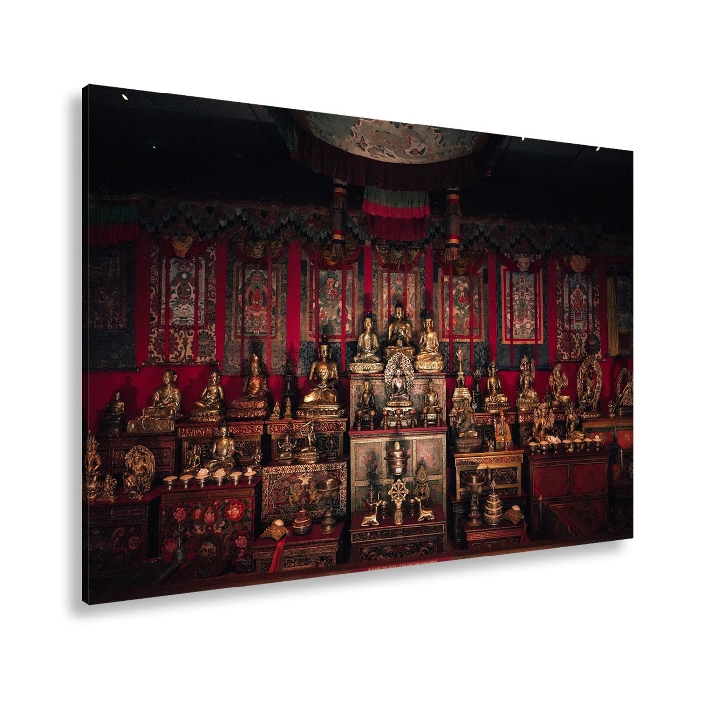 Leinwandbild Goldene Buddhas thronen in einem Meer aus rotem Samt. - deyoli