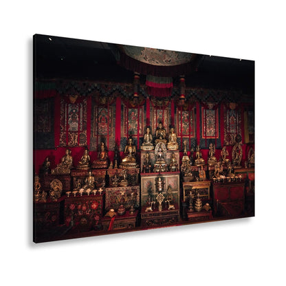 Leinwandbild Goldene Buddhas thronen in einem Meer aus rotem Samt. - deyoli